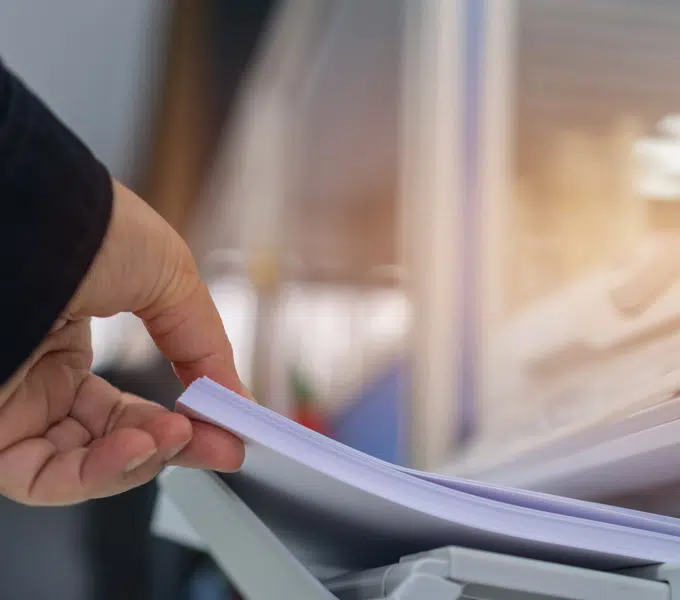 placing documents into a scanner